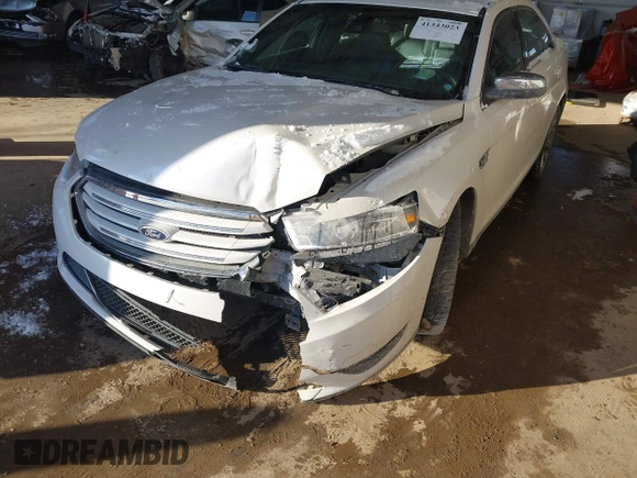 2015 Ford Taurus Limited z VIN 1FAHP2F88FG125499, wystawiony jako IAAI lot #41343023 z przebiegiem 126 047 mil mil oraz . Historia ofert i sprzedaży dostępna na DreamBid. Obrazek 18.