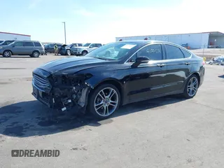 2016 Ford Fusion Titanium with VIN 3FA6P0K9XGR250007, listed as a IAAI auction lot 41775696 with 90,000 mi miles and . Bid and sale history available at DreamBid. Image 15.