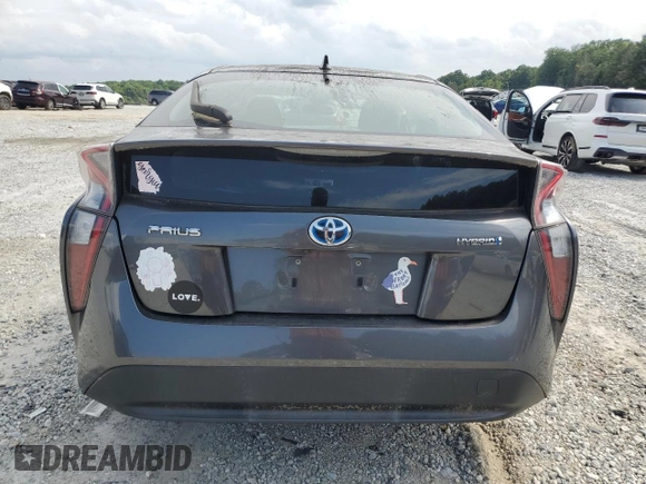2017 Toyota Prius Two z VIN JTDKBRFU5H3036407, wystawiony jako Copart lot #57320795 z przebiegiem 69 468 mil mil oraz Szkoda całkowita • Salvage title. Historia ofert i sprzedaży dostępna na DreamBid. Obrazek 6.