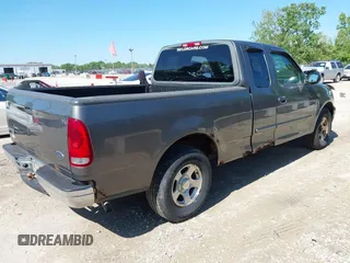 2002 Ford F-150 XL with VIN 2FTRX17262CA42006, listed as a IAAI auction lot 42344192 with 165,169 mi miles and . Bid and sale history available at DreamBid. Image 4.
