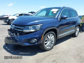 2015 Volkswagen Tiguan SE with VIN WVGAV7AX8FW595806, listed as a IAAI auction lot 42644395 with 51,638 mi miles and . Bid and sale history available at DreamBid. Image 18.