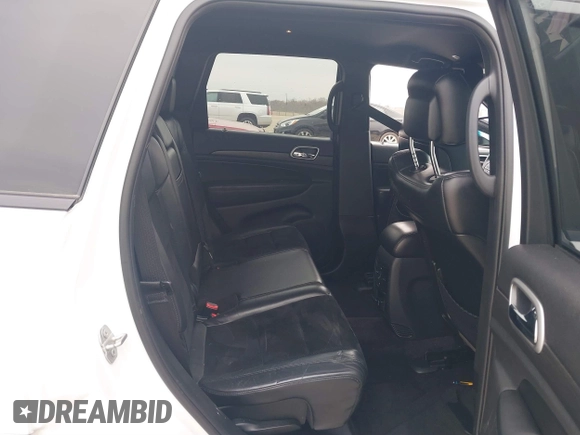 2018 Jeep Grand Cherokee Laredo E with VIN 1C4RJEAG0JC218694, listed as a IAAI auction lot 41587665 with 97,618 mi miles. Bid and sale history available at carsss.com. Image 8.