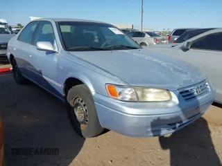 1997 Toyota Camry LE z VIN JT2BG22KXV0020738, wystawiony jako IAAI lot #42528874 z przebiegiem 324 864 mil mil oraz . Historia ofert i sprzedaży dostępna na DreamBid. Obrazek 1.