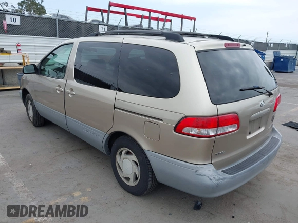 2002 Toyota Sienna LE with VIN 4T3ZF13C92U469670, listed as a IAAI auction lot 42141259 with 222,299 mi miles and . Bid and sale history available at DreamBid. Image 3.