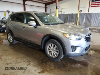 2014 Mazda CX-5 Touring z VIN JM3KE4CY5E0393463, wystawiony jako Copart lot #57776665 z przebiegiem 91 565 mil mil oraz Szkoda całkowita • Salvage title. Historia ofert i sprzedaży dostępna na DreamBid. Obrazek 4.