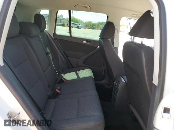 2014 Volkswagen Tiguan SE with VIN WVGAV3AX0EW614369, listed as a Copart auction lot 57664045 with 85,504 mi miles and Salvage title. Bid and sale history available at DreamBid. Image 11.