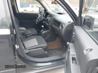 2014 Jeep Patriot Sport with VIN 1C4NJPBB7ED822885, listed as a IAAI auction lot 41947079 with 76,740 mi miles. Bid and sale history available at carsss.com. Image 5.