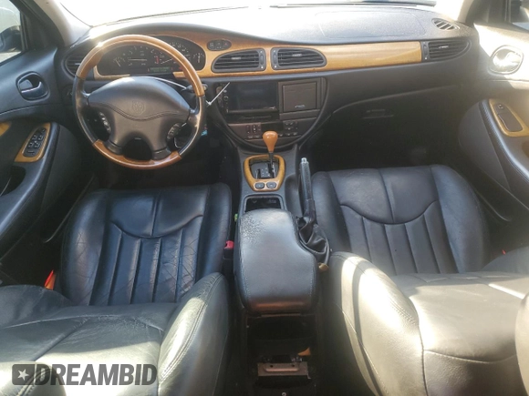 2000 Jaguar S-Type V8 z VIN SAJDA01D4YGL61655, wystawiony jako Copart lot #85873054 z przebiegiem 85 239 mil mil oraz Nie do naprawy • Non repairable. Historia ofert i sprzedaży dostępna na DreamBid. Obrazek 8.