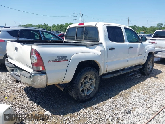 2013 Toyota Tacoma with VIN 5TFLU4EN0DX071533, listed as a IAAI auction lot 42050609 with 204,624 mi miles and . Bid and sale history available at DreamBid. Image 4.
