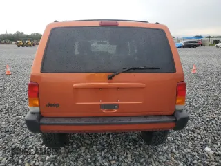 1999 Jeep Cherokee Sport with VIN 1J4FF68S7XL560943, listed as a Copart auction lot 58425505 with 68,654 mi miles and Salvage title. Bid and sale history available at DreamBid. Image 6.