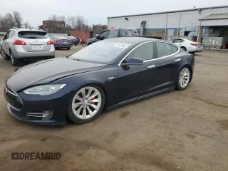 2014 Tesla Model S P85D with VIN 5YJSA1H29EFP63144, listed as a Copart auction lot 51837695 with 142,333 mi miles and Clean Title. Bid and sale history available at DreamBid. Image 1.