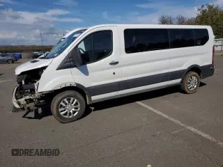 2018 Ford Transit Passenger XL with VIN 1FBZX2ZM0JKB03367, listed as a Copart auction lot 73154704 with 157,617 mi miles and Salvage Title. Bid and sale history available at DreamBid. Image 1.