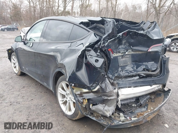2022 Tesla Model Y Long Range with VIN 7SAYGDEE5NA016892, listed as a IAAI auction lot 41936735 with 69,136 mi miles and . Bid and sale history available at DreamBid. Image 3.