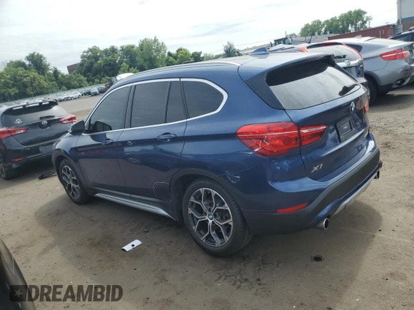2021 BMW X1 xDrive28i with VIN WBXJG9C0XM5U47141, listed as a Copart auction lot 60645865 with 56,106 mi miles and Salvage title. Bid and sale history available at DreamBid. Image 2.