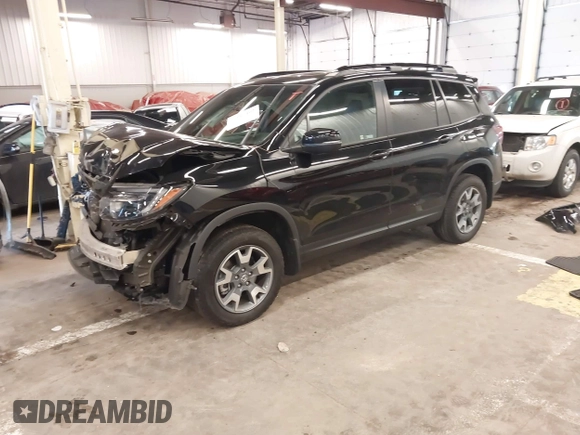 2023 Honda Passport TrailSport with VIN 5FNYF8H64PB016819, listed as a IAAI auction lot 41997402 with 22,106 mi miles and . Bid and sale history available at DreamBid. Image 2.