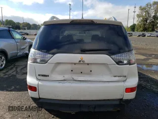 2009 Mitsubishi Outlander SE z VIN JA4MT31W69Z001475, wystawiony jako Copart lot #74098814 z przebiegiem 142 351 mil mil oraz Szkoda całkowita • Salvage title. Historia ofert i sprzedaży dostępna na DreamBid. Obrazek 6.