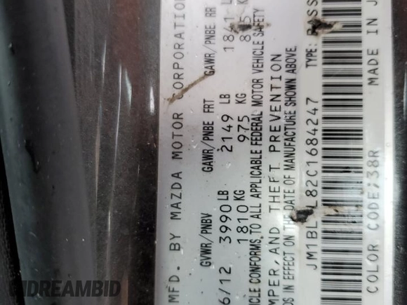 2012 Mazda 3 i Touring z VIN JM1BL1L82C1684247, wystawiony jako Copart lot #56695975 z przebiegiem 229 778 mil mil oraz Szkoda całkowita • Salvage title. Historia ofert i sprzedaży dostępna na DreamBid. Obrazek 12.