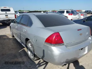 2014 Chevrolet Impala LT with VIN 2G1WB5E32E1146716, listed as a IAAI auction lot 41967440 with 143,593 mi miles and . Bid and sale history available at DreamBid. Image 3.