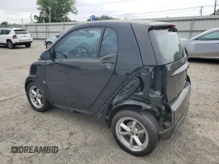 2014 Smart fortwo Pure z VIN WMEEJ3BA2EK733447, wystawiony jako Copart lot #53882735 z przebiegiem Nie podano mil oraz Tytuł czysty. Historia ofert i sprzedaży dostępna na DreamBid. Obrazek 2.