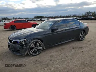 2017 BMW 7 Series 750i with VIN WBA7F0C50HGM21060, listed as a Copart auction lot 88410465 with 82,110 mi miles and Salvage Title. Bid and sale history available at carsss.com. Image 1.