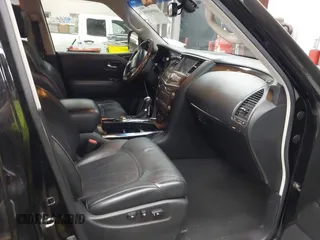 2014 Infiniti QX80 with VIN JN8AZ2NF2E9555963, listed as a IAAI auction lot 41894699 with 143,255 mi miles. Bid and sale history available at carsss.com. Image 5.