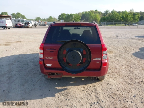 2006 Suzuki Grand Vitara Luxury with VIN JS3TD947564104838, listed as a IAAI auction lot 42082783 with 122,912 mi miles. Bid and sale history available at carsss.com. Image 6.