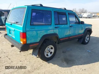 1996 Jeep Cherokee Sport z VIN 1J4FJ68S2TL103997, wystawiony jako IAAI lot #41517835 z przebiegiem 175 560 mil mil oraz . Historia ofert i sprzedaży dostępna na DreamBid. Obrazek 4.