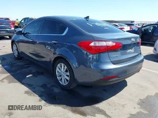 2014 Kia Forte EX with VIN KNAFX4A84E5112910, listed as a IAAI auction lot 42039761 with 118,126 mi miles. Bid and sale history available at carsss.com. Image 3.