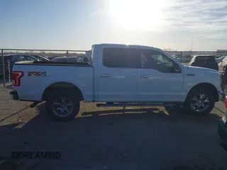 2015 Ford F-150 XLT with VIN 1FTEW1EF1FFA15054, listed as a IAAI auction lot 41780219 with 185,059 mi miles. Bid and sale history available at carsss.com. Image 13.