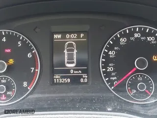 2012 Volkswagen Passat SE w/Sunroof with VIN 1VWBH7A36CC077412, listed as a IAAI auction lot 41651796 with 113,259 mi miles. Bid and sale history available at carsss.com. Image 7.