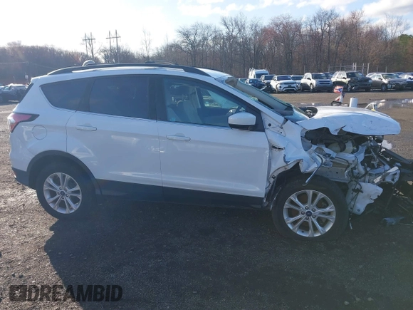 2017 Ford Escape SE with VIN 1FMCU9GD5HUE00425, listed as a IAAI auction lot 41843115 with 64,896 mi miles. Bid and sale history available at carsss.com. Image 13.