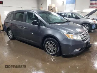 2012 Honda Odyssey EX-L with VIN 5FNRL5H69CB143572, listed as a Copart auction lot 48614255 with 114,490 mi miles and Salvage Title. Bid and sale history available at carsss.com. Image 4.