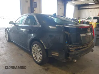 2011 Cadillac CTS Performance with VIN 1G6DL5ED6B0131490, listed as a IAAI auction lot 41980231 with 75,040 mi miles and . Bid and sale history available at DreamBid. Image 3.