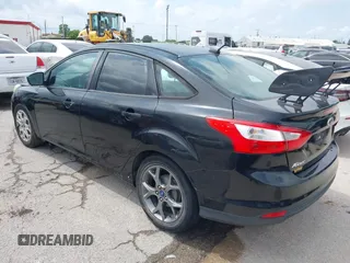2012 Ford Focus SE with VIN 1FAHP3F28CL361932, listed as a IAAI auction lot 42142318 with 135,179 mi miles and . Bid and sale history available at carsss.com. Image 3.