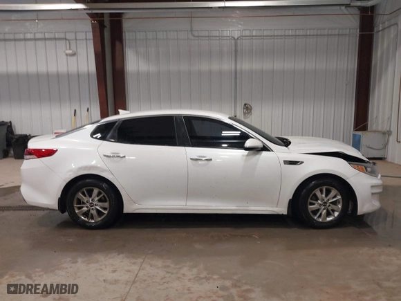 2016 Kia Optima LX with VIN KNAGT4L30G5072605, listed as a IAAI auction lot 41562330 with 152,320 mi miles. Bid and sale history available at carsss.com. Image 13.