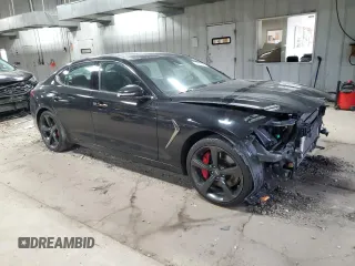 2019 Genesis G70 Advanced with VIN KMTG34LE9KU025478, listed as a Copart auction lot 49776525 with 57,583 mi miles and Salvage title. Bid and sale history available at DreamBid. Image 4.