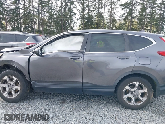 2019 Honda CR-V EX with VIN JHLRW2H57KX022530, listed as a IAAI auction lot 41970376 with 51,327 mi miles. Bid and sale history available at carsss.com. Image 15.