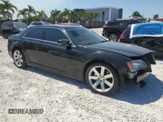 2012 Chrysler 300 SRT8 with VIN 2C3CCAFJXCH800724, listed as a Copart auction lot 49680465 with 87,279 mi miles and Salvage Title. Bid and sale history available at carsss.com. Image 4.