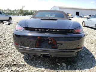 2017 Porsche 718 Boxster z VIN WP0CA2A85HS221846, wystawiony jako Copart lot #55542923 z przebiegiem 32 293 mil mil oraz . Historia ofert i sprzedaży dostępna na DreamBid. Obrazek 6.