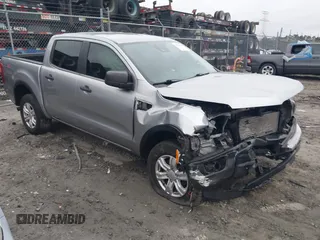 2020 Ford Ranger XL z VIN 1FTER4EH2LLA41184, wystawiony jako IAAI lot #41721953 z przebiegiem 74 054 mil mil oraz . Historia ofert i sprzedaży dostępna na DreamBid. Obrazek 1.