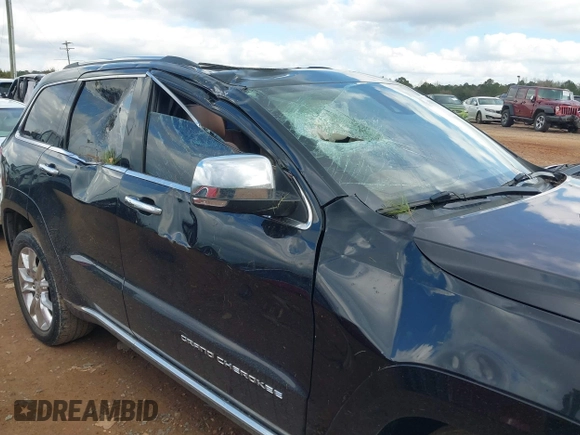 2015 Jeep Grand Cherokee Summit with VIN 1C4RJFJT1FC768707, listed as a IAAI auction lot 41863454 with 122,564 mi miles. Bid and sale history available at carsss.com. Image 6.