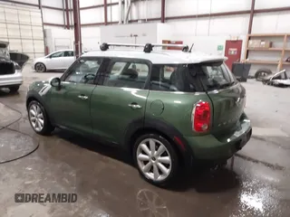 2015 MINI Countryman with VIN WMWZB3C50FWR43714, listed as a IAAI auction lot 41589778 with 93,404 mi miles and . Bid and sale history available at DreamBid. Image 3.