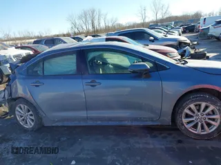 2023 Toyota Corolla Hybrid LE with VIN JTDBCMFE2P3007258, listed as a IAAI auction lot 41416080 with 12,517 mi miles. Bid and sale history available at carsss.com. Image 13.