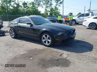 2014 Ford Mustang V6 with VIN 1ZVBP8AM4E5228370, listed as a IAAI auction lot 42130306 with 113,015 mi miles. Bid and sale history available at carsss.com. Image 1.