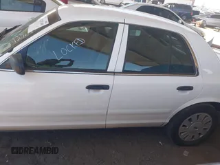 2006 Ford Police Interceptor z VIN 2FAHP71W26X142764, wystawiony jako IAAI lot #42387490 z przebiegiem Nie podano mil oraz . Historia ofert i sprzedaży dostępna na DreamBid. Obrazek 14.