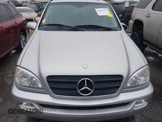 2002 Mercedes-Benz M-Class with VIN 4JGAB54E92A352889, listed as a IAAI auction lot 41805001 with 174,758 mi miles. Bid and sale history available at carsss.com. Image 12.