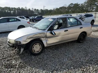 1998 Mitsubishi Mirage DE z VIN JA3AY26A3WU041117, wystawiony jako Copart lot #88280675 z przebiegiem 213 243 mil mil oraz Szkoda całkowita • Salvage title. Historia ofert i sprzedaży dostępna na DreamBid. Obrazek 1.