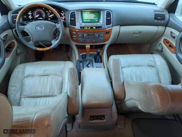 2004 Lexus LX 470 with VIN JTJHT00W243543558, listed as a Copart auction lot 74859974 with 189,556 mi miles and Salvage Title. Bid and sale history available at carsss.com. Image 8.