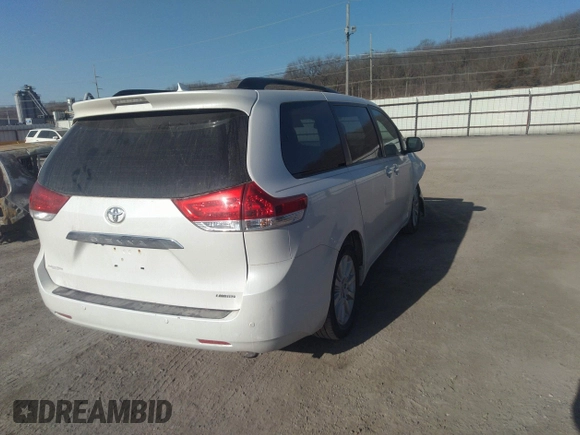 2014 Toyota Sienna XLE with VIN 5TDYK3DC3ES491381, listed as a IAAI auction lot 41803362 with 253,940 mi miles. Bid and sale history available at carsss.com. Image 4.