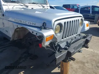 2004 Jeep Wrangler Rubicon with VIN 1J4FA69S94P701660, listed as a IAAI auction lot 41699554 with 74,640 mi miles. Bid and sale history available at carsss.com. Image 6.